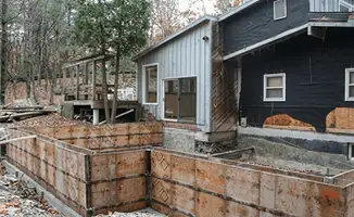Prepared site with foundation forms for home remodeling and addition project in Charlotte, NC